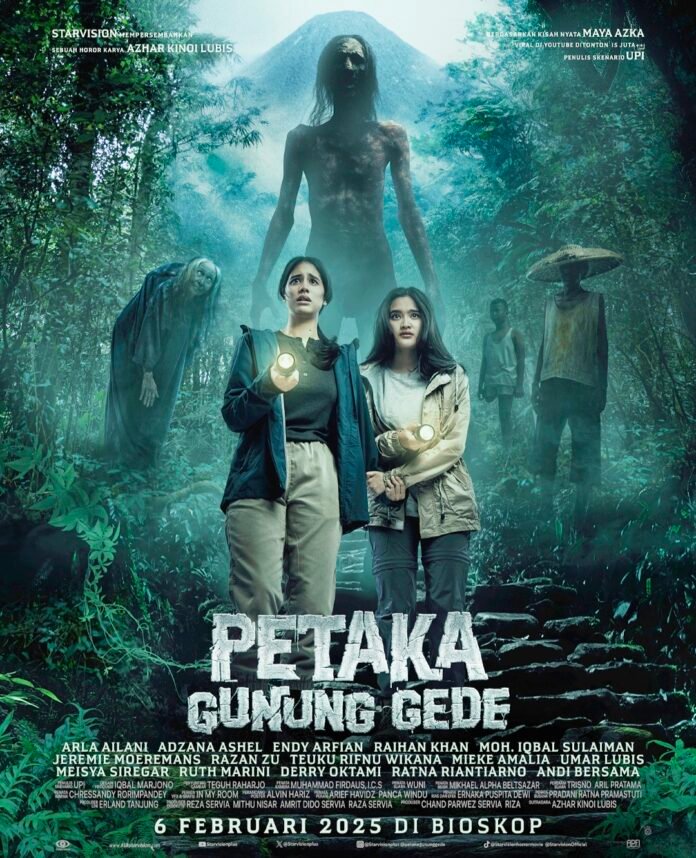 Petaka Gunung Gede movie poster featuring three main characters standing in a misty forest background with mystical blue tones.